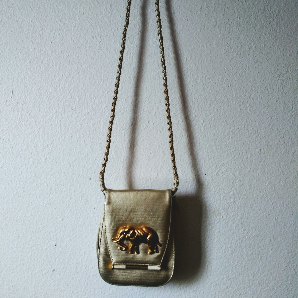 Nima gold elephant purse